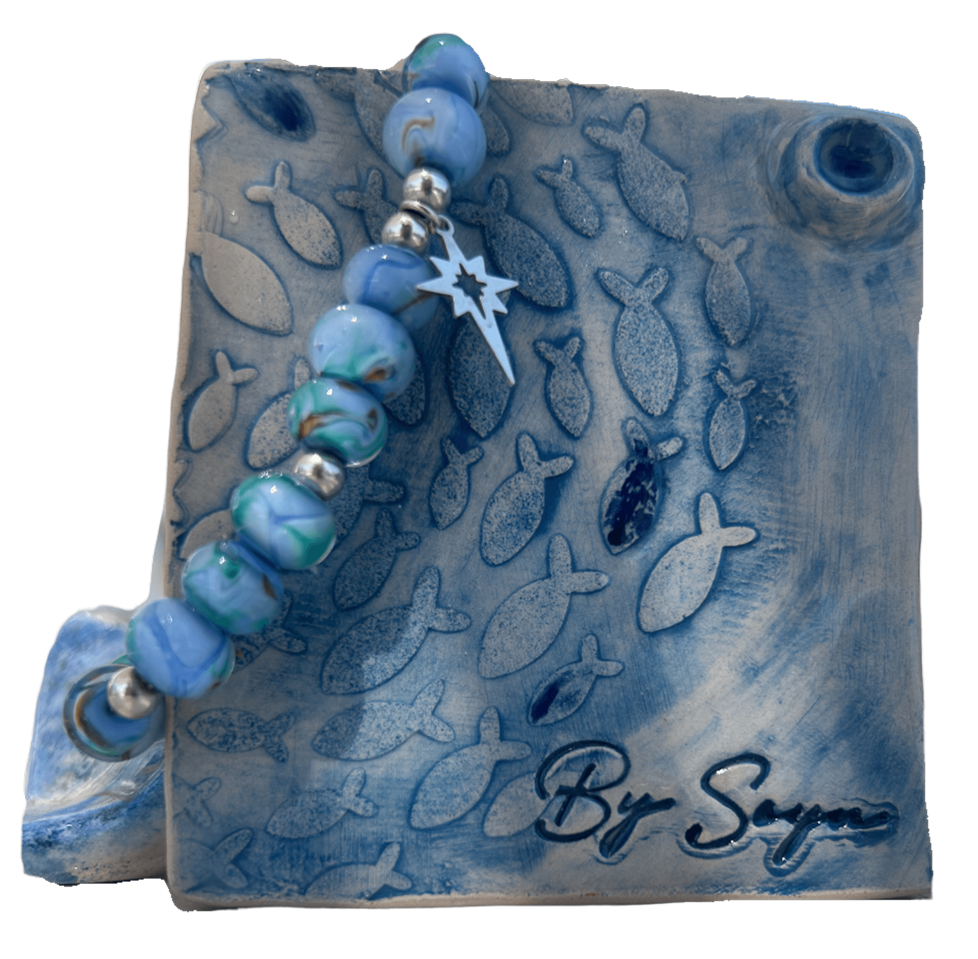 El yapımı seramik vazo, kum dalgaları deseni